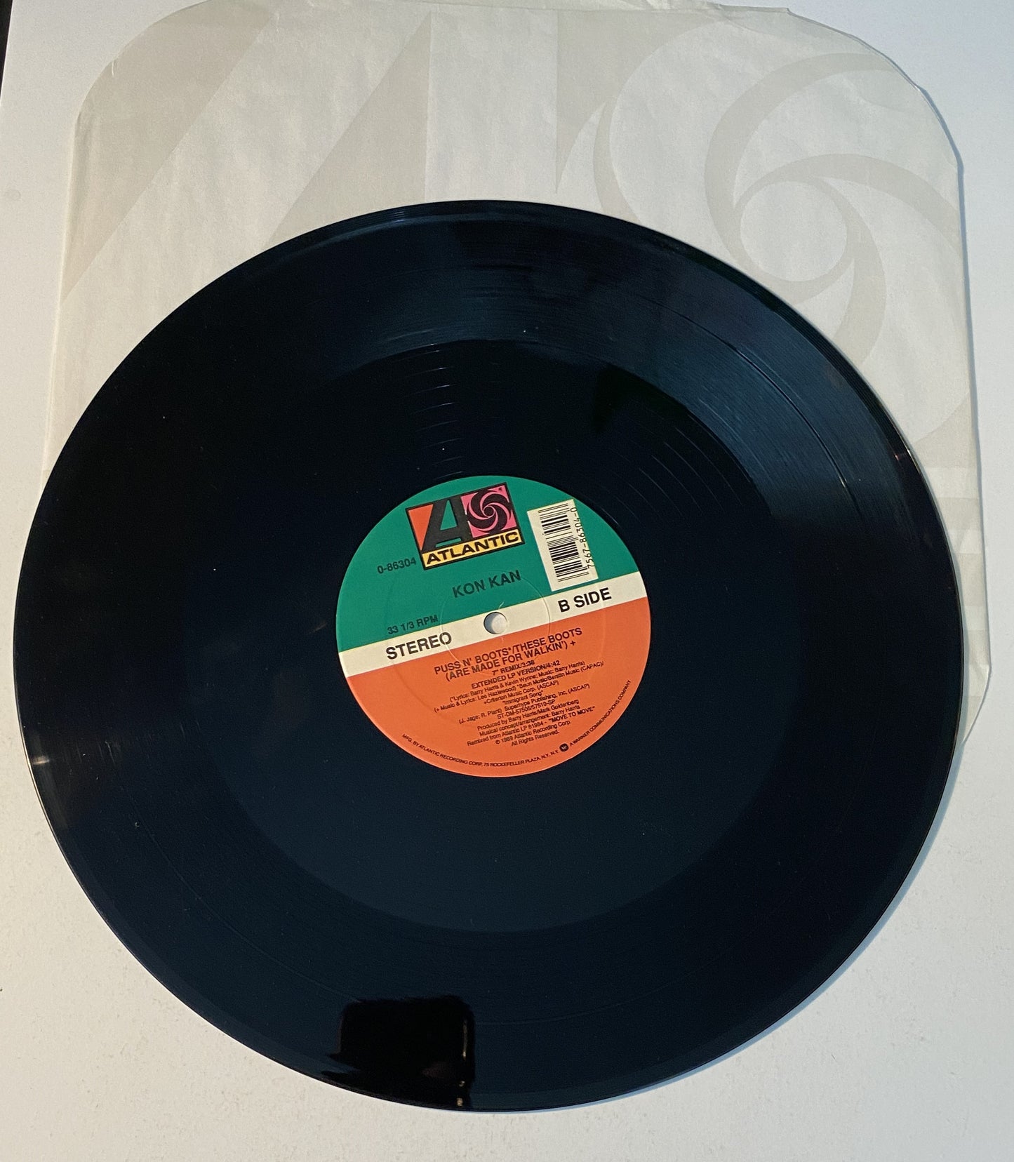 Kon Kan Puss N' Boots / These Boots Are Made For Walking (12" Single) Vinyl